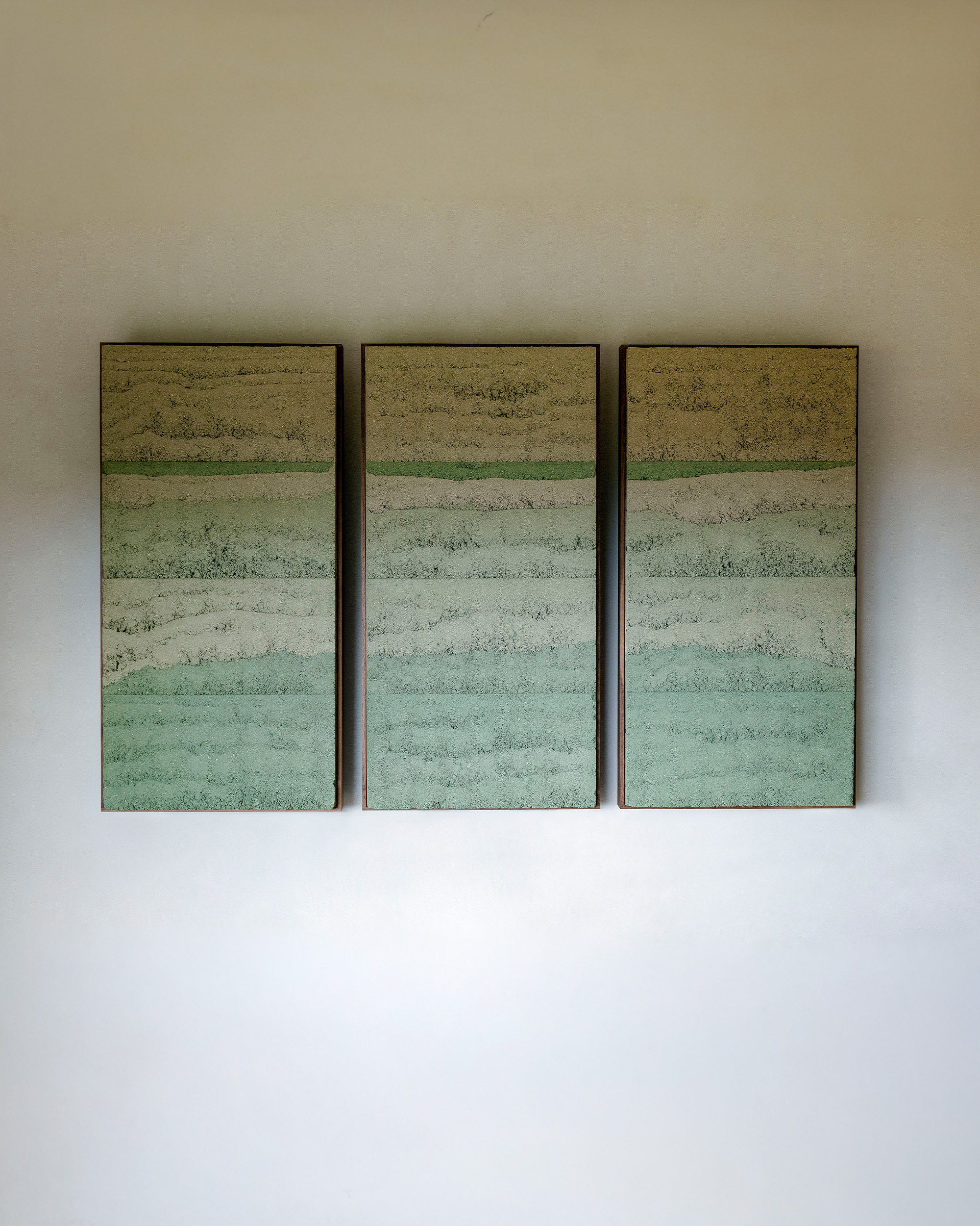 Hand-formed clay triptych artwork by Adam Weismann
